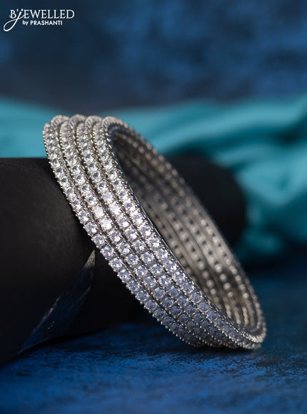 Zircon bangle with cz stones