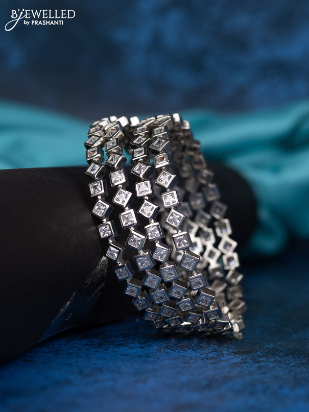 Zircon bangle with cz stones