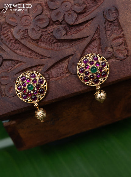 Antique earring with kemp stones and golden beads hanging