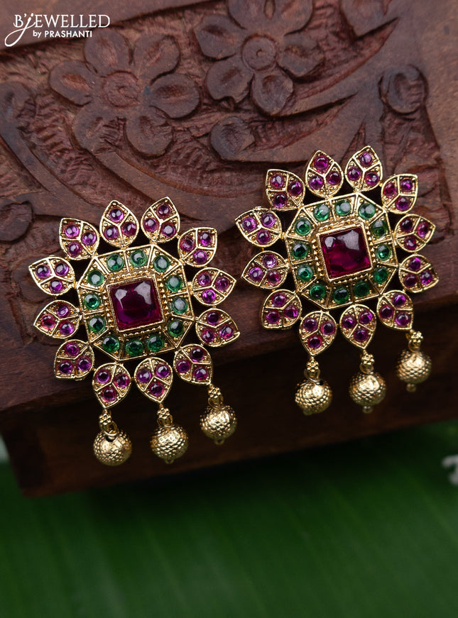 Antique earring with kemp stones and golden beads hanging