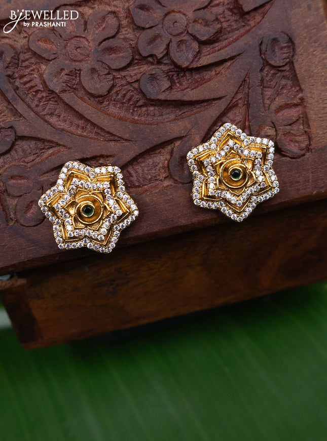Antique earring floral design with green kemp and cz stones