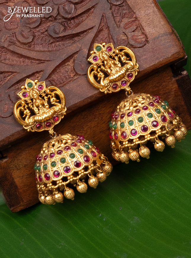 Antique jhumka lakshmi design with kemp stones and golden beads hanging