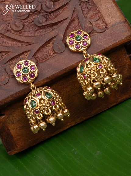 Antique jhumka with kemp stones and golden beads hanging