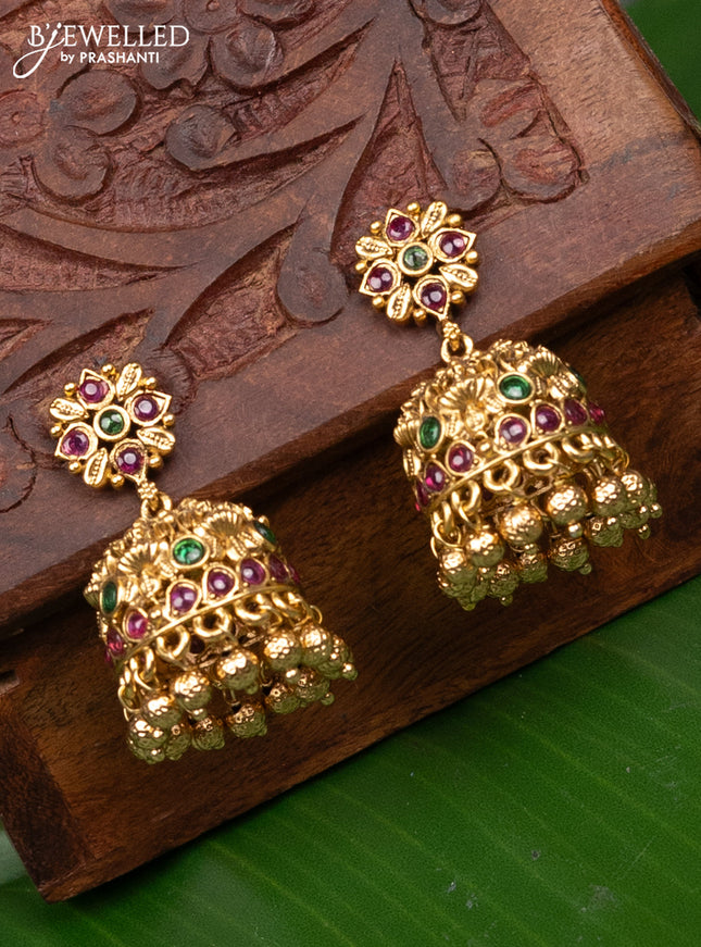Antique jhumka with kemp stones and golden beads hanging