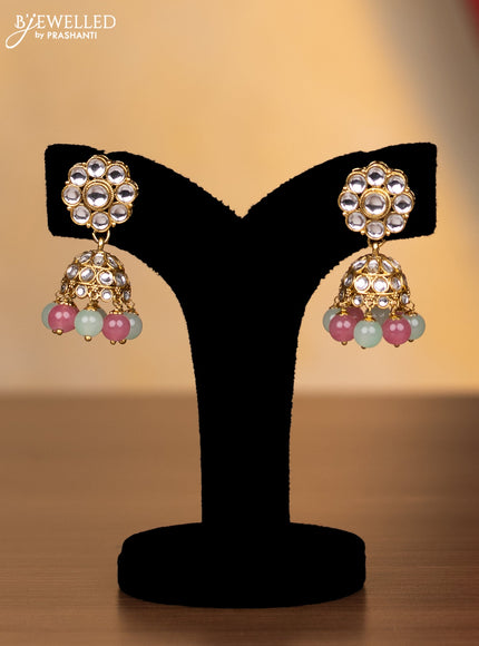Kundan necklace with pink and mint green beads hanging