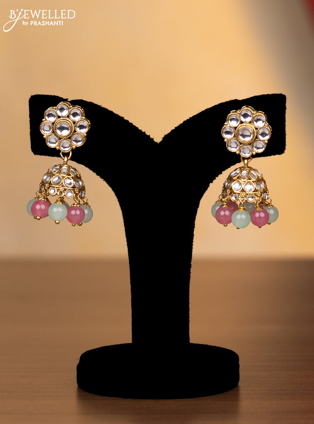 Kundan necklace with pink and mint green beads hanging
