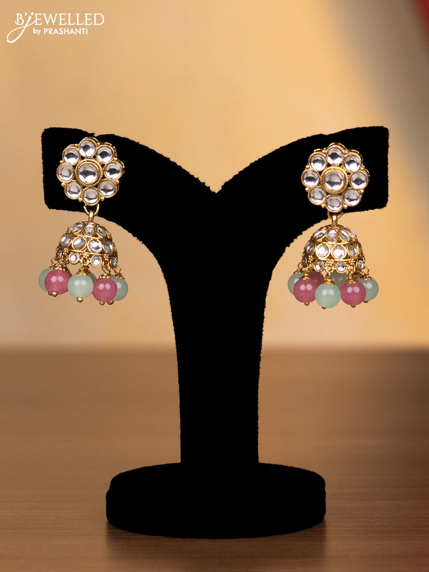 Kundan necklace with pink and mint green beads hanging