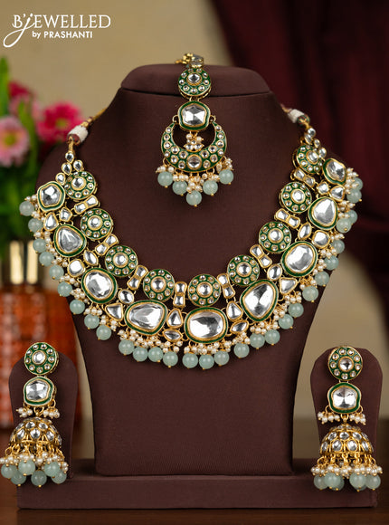 Kundan necklace with maang tikka and pearl & mint green beads hanging