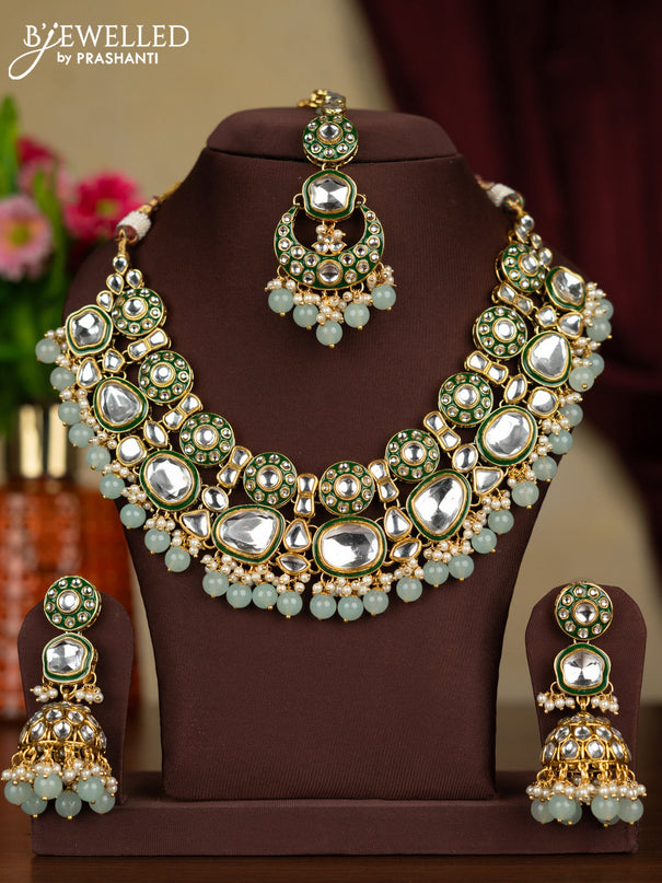 Kundan necklace with maang tikka and pearl & mint green beads hanging