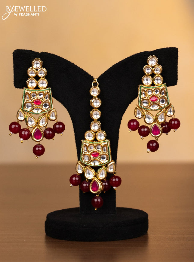 Kundan necklace ruby stones with maang tikka and maroon beads hanging