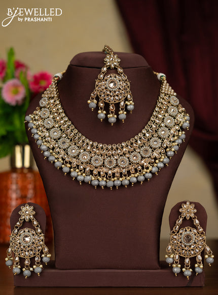 Kundan necklace with maang tikka and pearl & grey beads hanging