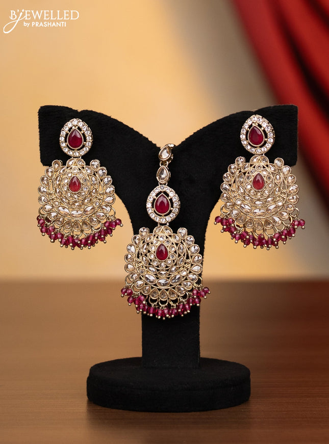 Kundan necklace ruby stones with maang tikka and pink beads hanging
