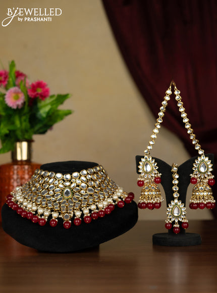 Kundan necklace with maang tikka and pearl & pink beads hanging
