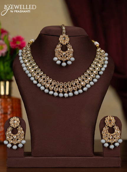 Kundan necklace with maang tikka and grey beads hanging