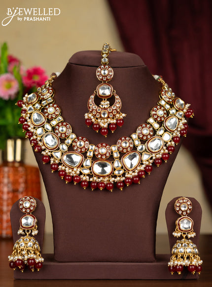 Kundan necklace with maang tikka and pearl & maroon beads hanging
