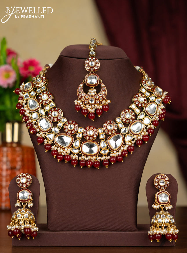 Kundan necklace with maang tikka and pearl & maroon beads hanging