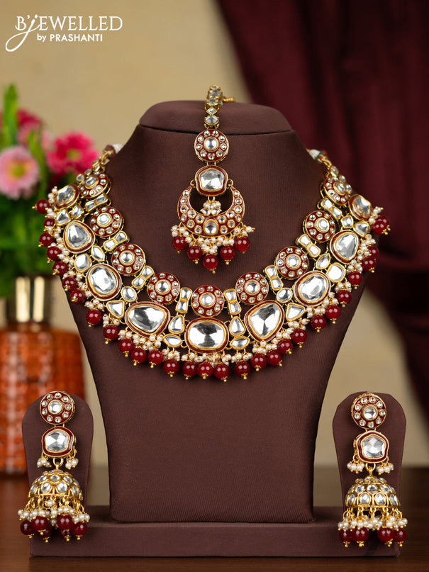 Kundan necklace with maang tikka and pearl & maroon beads hanging