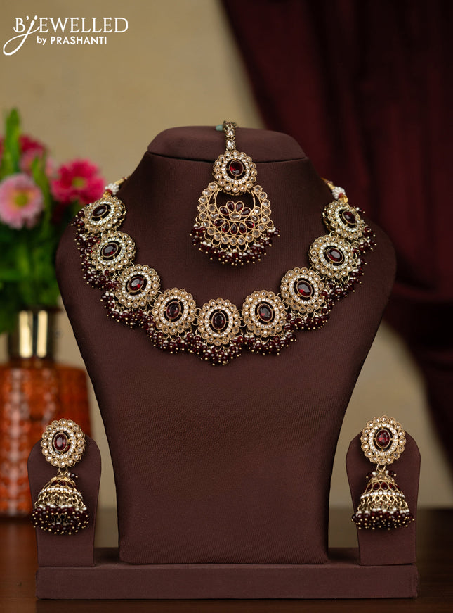 Kundan necklace ruby stones with maang tikka and pearl & maroon beads hanging