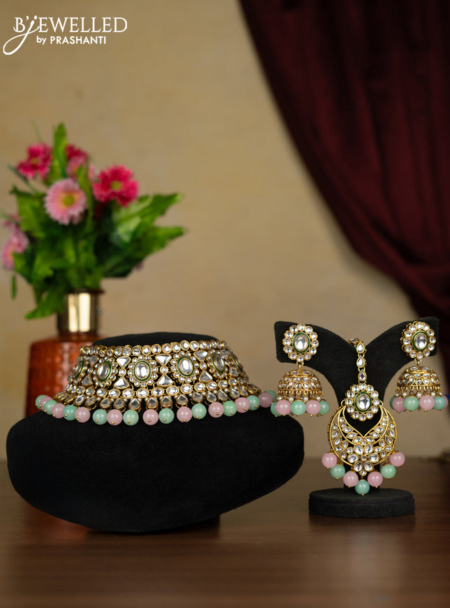 Kundan necklace with maang tikka and baby pink & mint green beads hanging