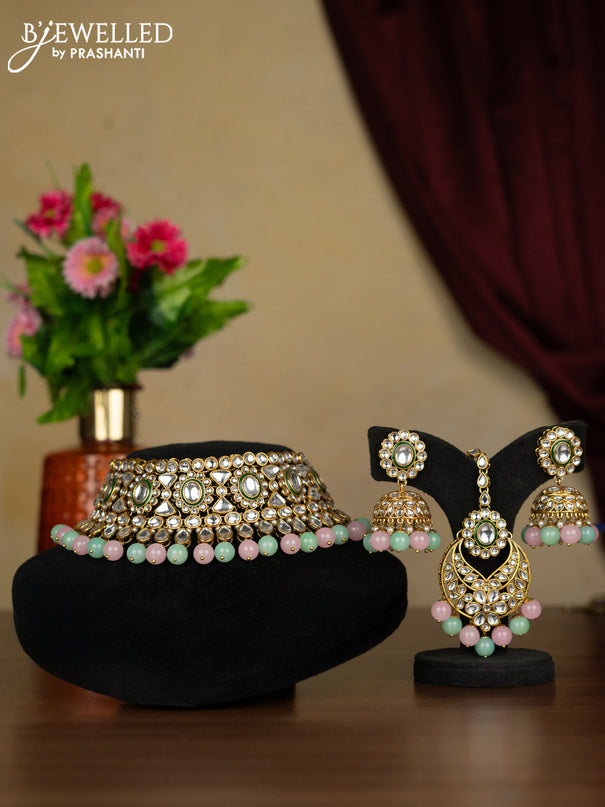 Kundan necklace with maang tikka and baby pink & mint green beads hanging