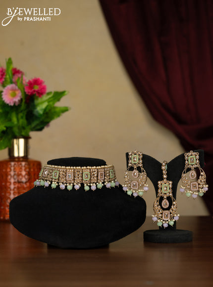 Kundan necklace with maang tikka and baby pink & mint green beads hanging