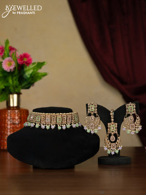 Kundan necklace with maang tikka and baby pink & mint green beads hanging