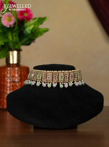 Kundan necklace with maang tikka and baby pink & mint green beads hanging