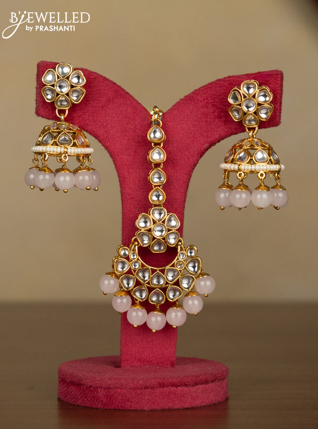 Kundan kundan necklace with maang tikka and baby pink beads hanging