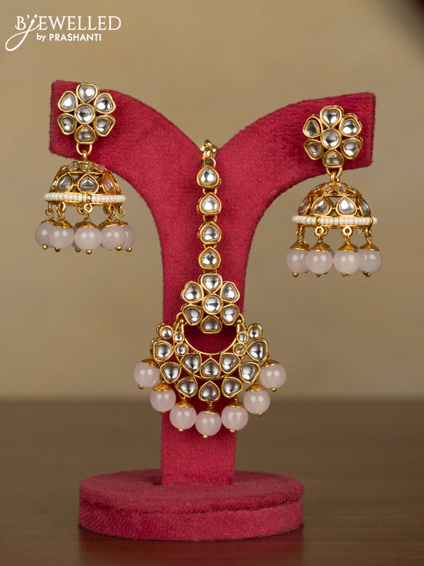 Kundan kundan necklace with maang tikka and baby pink beads hanging