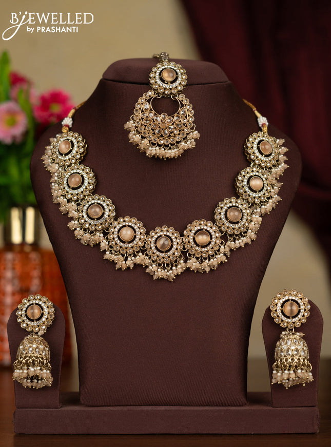 Kundan necklace peach stones with maang tikka and peach beads hanging