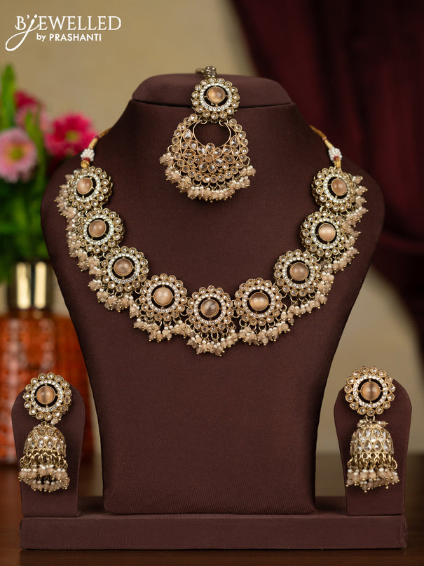 Kundan necklace peach stones with maang tikka and peach beads hanging