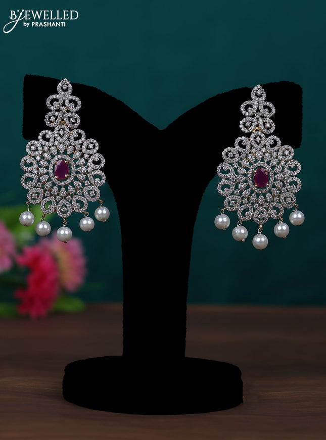 Zircon earring with ruby & cz stones and pearl hangings ingold finish