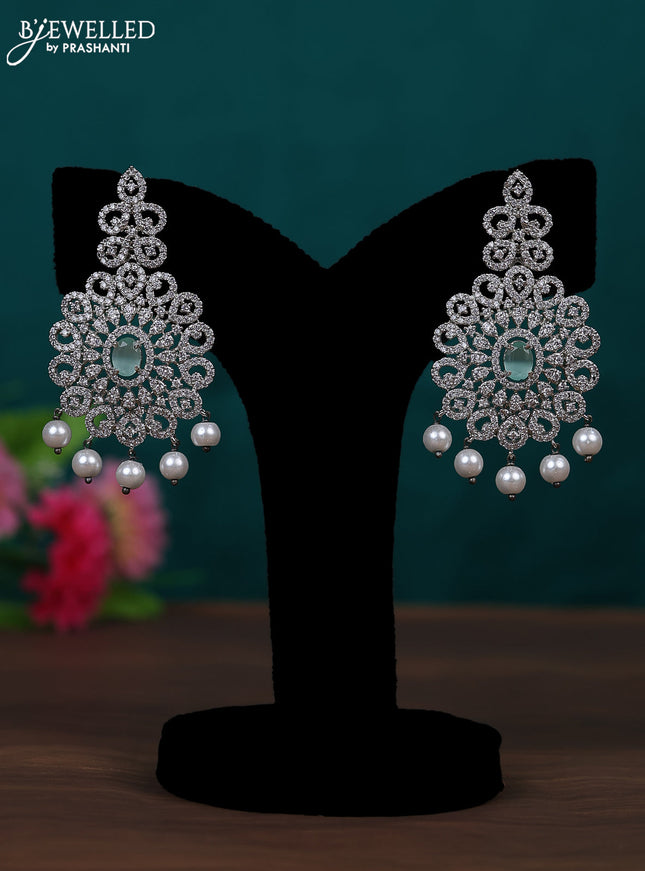 Zircon earring with mint green & cz stones and pearl hangings