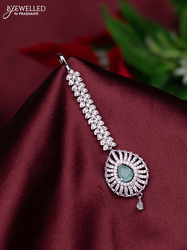 Zircon maang tikka with mint green & cz stones and hanings