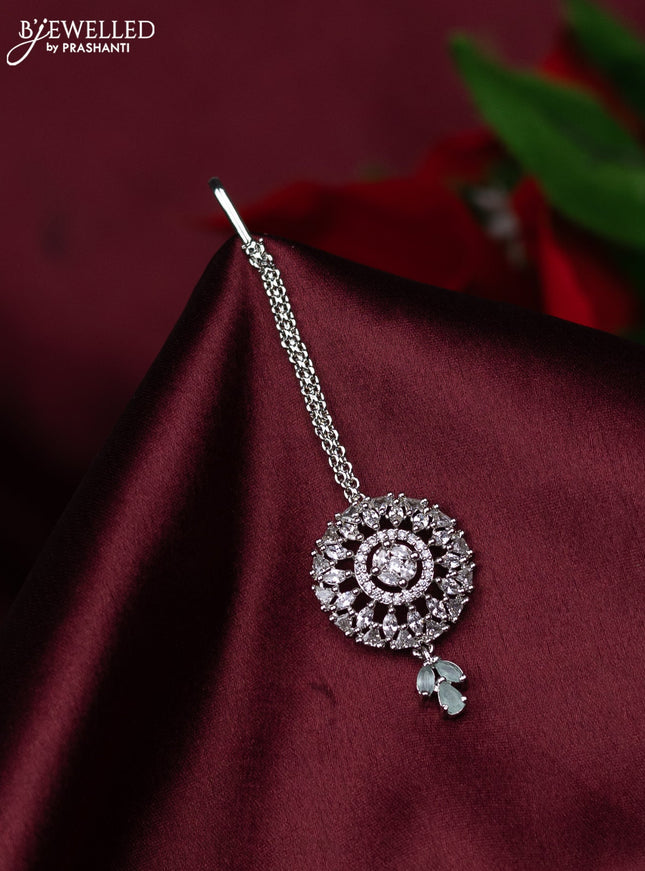 Zircon maang tikka with mint green & cz stones and hanings