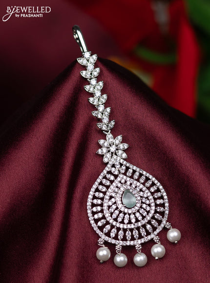 Zircon maang tikka with mint green & cz stones and pearl hanings