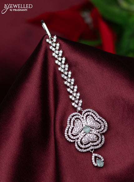 Zircon maang tikka floral design with mint green & cz stones and hanings