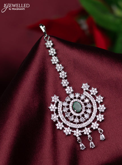 Zircon maang tikka floral design with emerald & cz stones and hanings