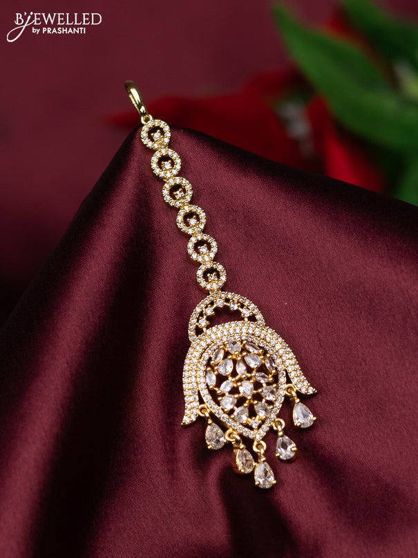 Zircon maang tikka with cz stones and hanings in gold finish