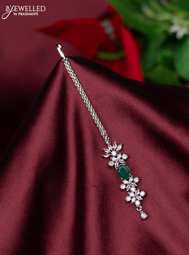 Zircon maang tikka floral design with emerald & cz stones and hanings
