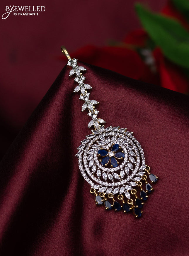 Zircon maang tikka floral design with sapphire & cz stones and hanings in gold finish