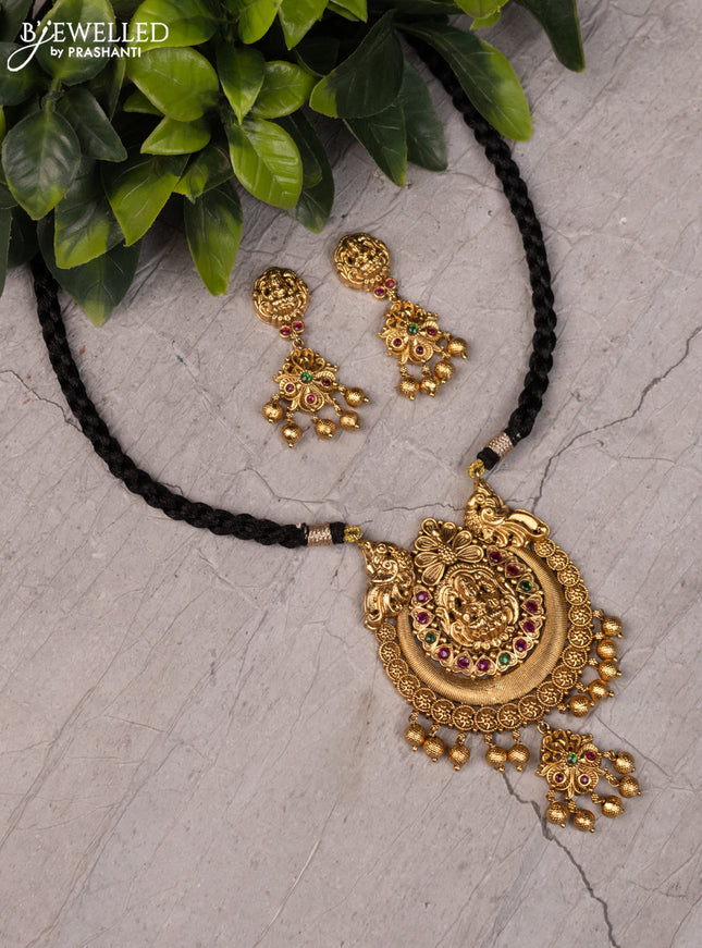 Black thread necklace with lakshmi pendant and golden beads hangings