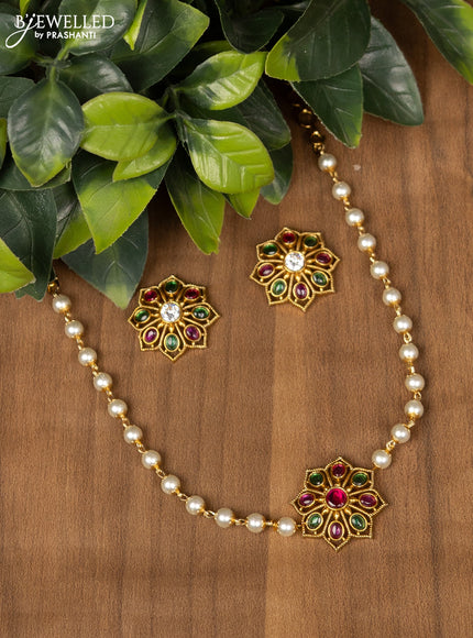 Pearl choker with kemp and cz stone