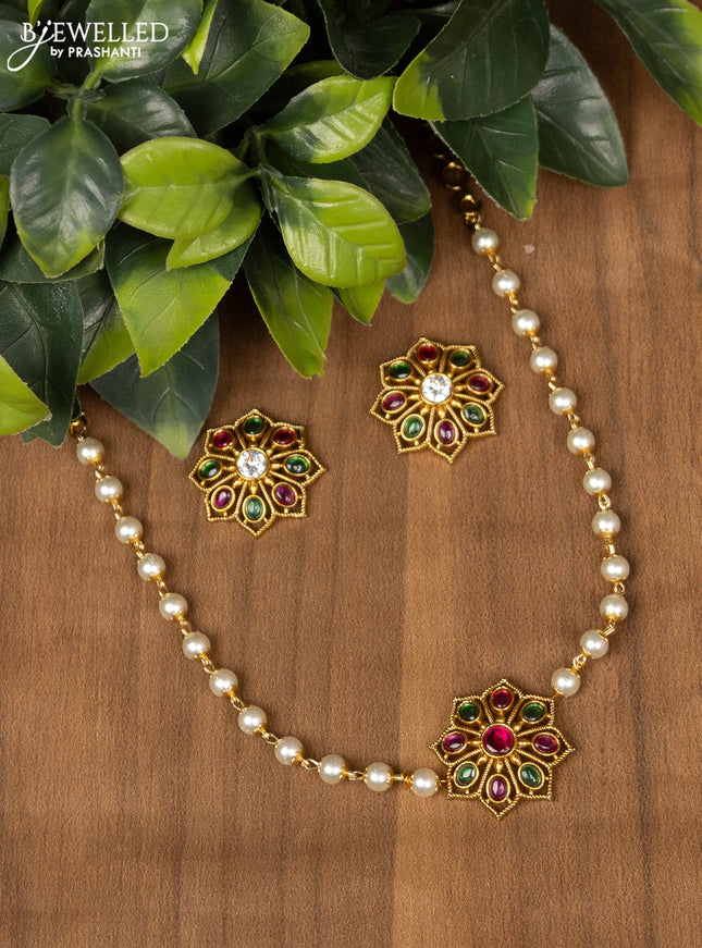 Pearl choker with kemp and cz stone