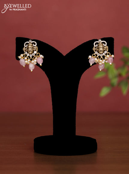 Beaded baby pink necklace with thirupati balaji pendant with cz stones and pearl hangings in victorian finish