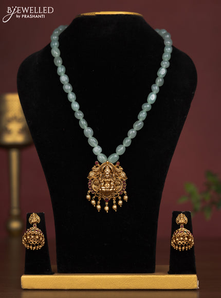 Beaded mint green necklace lakshmi pendant with pink kemp and golden beads hangings