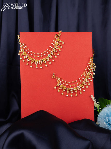 Antique triple layer maatal floral design with kemp & cz stones and pearl hangings