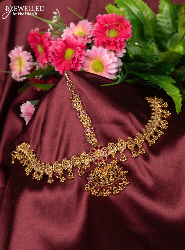 Antique maang tikka peacock design with pink kemp stones and golden beads hanging