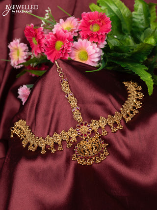 Antique maang tikka peacock design with pink kemp stones and golden beads hanging