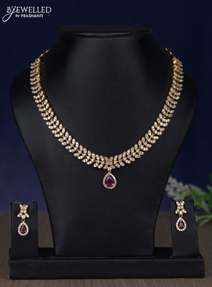 Zircon necklace with ruby and cz stones in gold finish